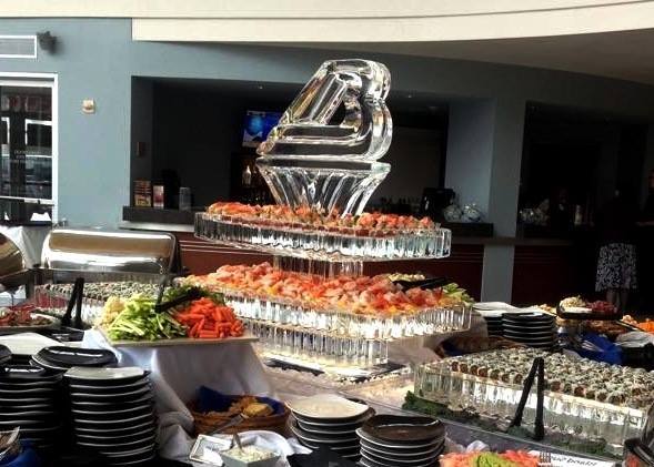 Bergstrom Automotive featured this seafood/sushi station from the help of High Cliff Catering and Krystal Kleer Ice Sculptures, LLC. 