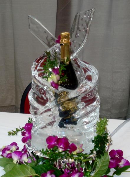 Keep your favorite drink cold with a one of a kind drink holder built from ice. Krystal Kleer Ice Sculptures can incorporate your favorite flowers, wedding colors, and more to match your event theme. 