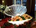 This is an example of a function ice sculpture used as a seafood display. Keep your food cold and draw attention with a custom ice sculpture from Krystal Kleer Ice Sculptures, LLC. Functional Display work beautifully for seafood, fruit and/or vegetables at any corporate or private event!