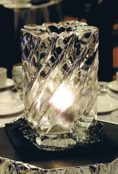 Krystal Kleer Ice Sculptures, LLC has been providing beautiful, "hand-carved" ice sculptures throughout Wisconsin and beyond since 1988. Mini table centerpieces are one of our customer's favorites. 
