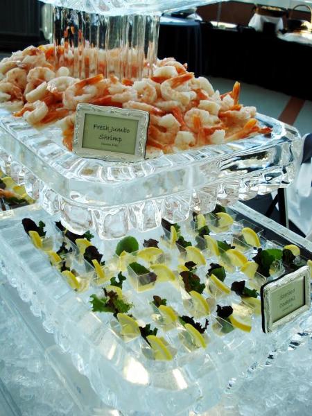 This custom shrimp display in the form of a functional food display was brought to you by Krystal Kleer Ice Sculptures, LLC. This Fried Jumbo Shrimp Display was a huge hit! Keep your food cold and your guest coming back for more. 